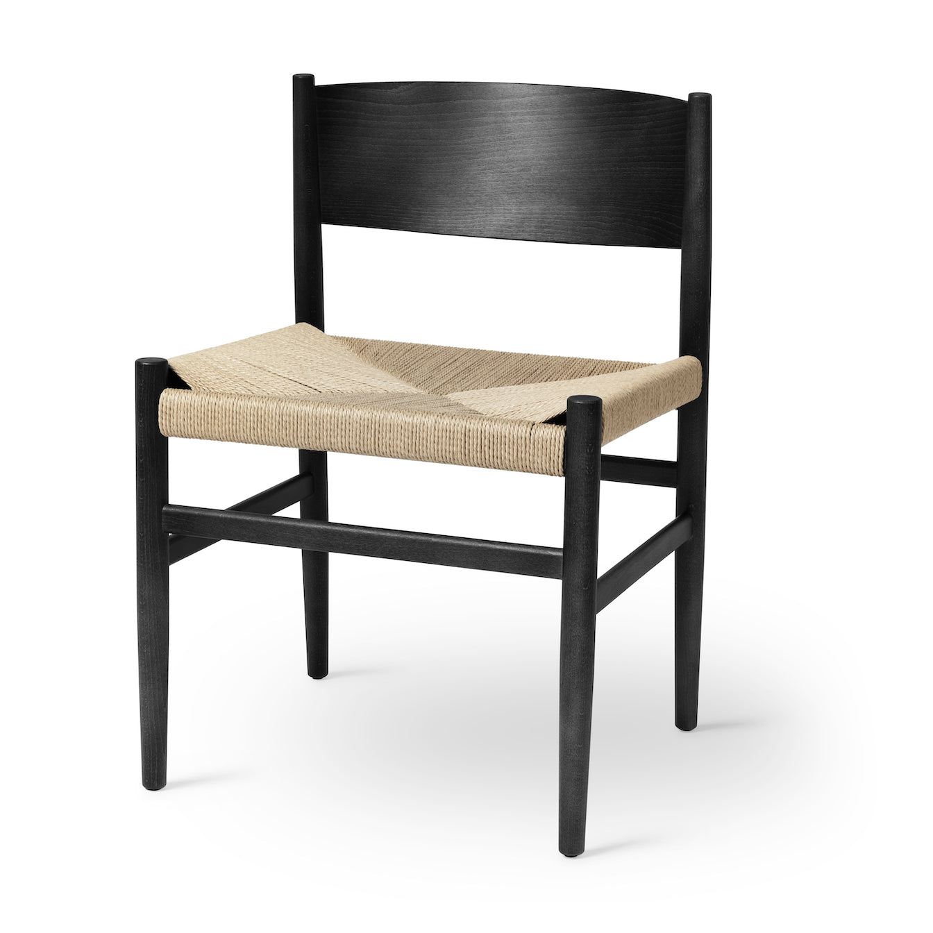 A black natural Nestor chair made of FSC-certified wood, by Mater.