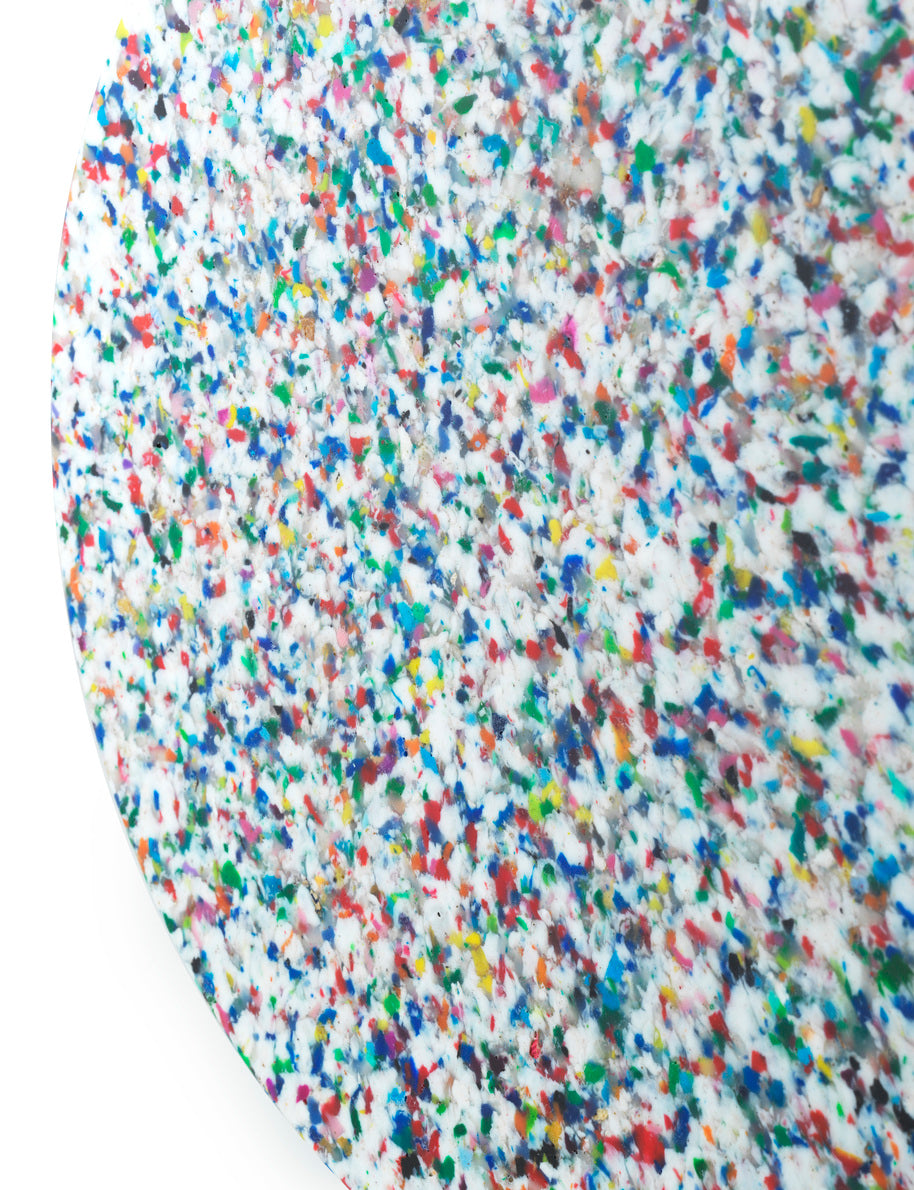A Bit Stool in White Multicolor, made of recycled plastic by Normann Copenhagen, detailed view.