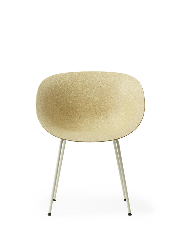 A renewable Mat Armchair made with hemp plants by Normann Copenhagen, with white-coated legs, front view.