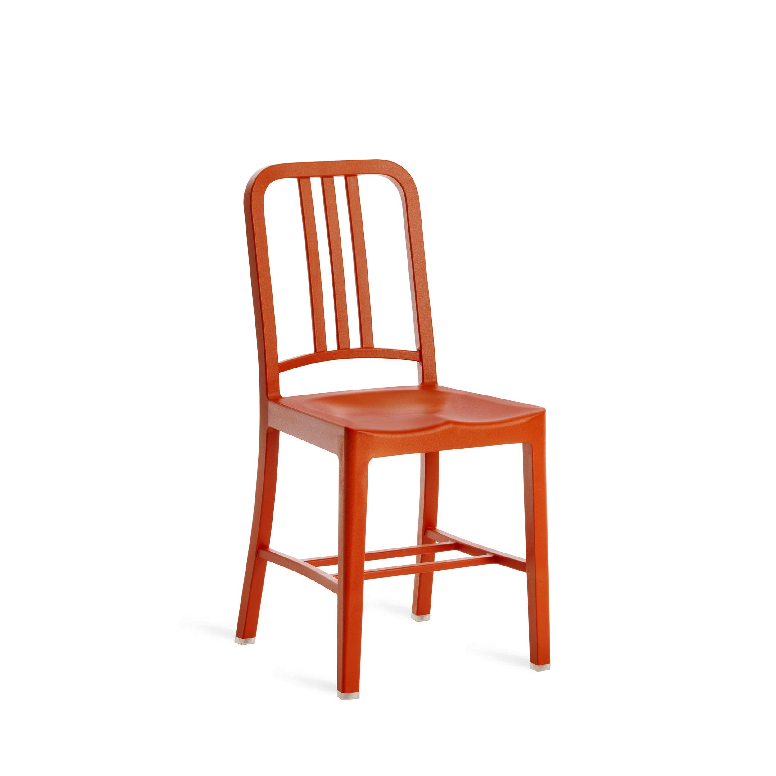 A recycled plastic 111 Navy Chair by Emeco, in orange.
