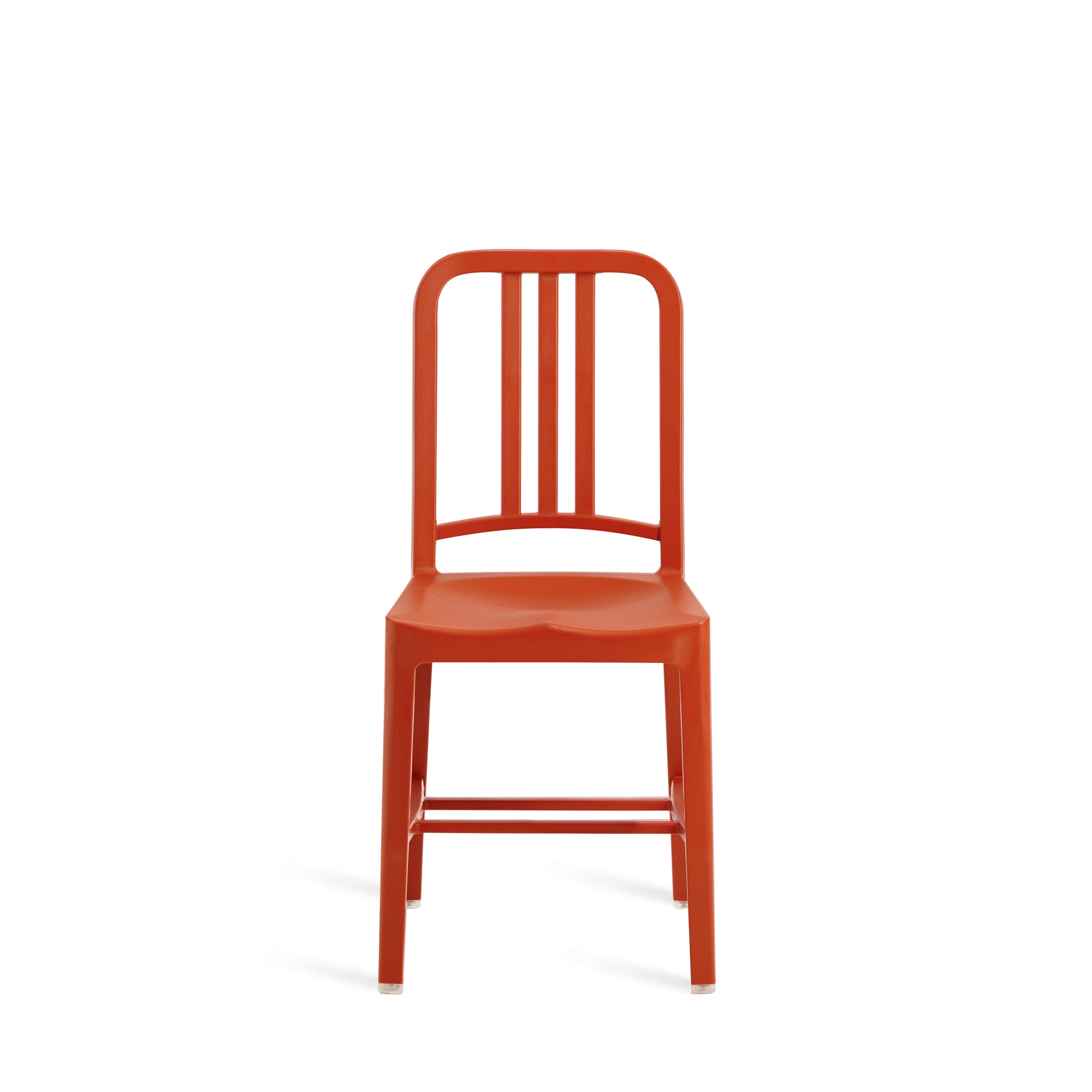 A recycled plastic  111 Navy Chair by Emeco, in orange, front view.