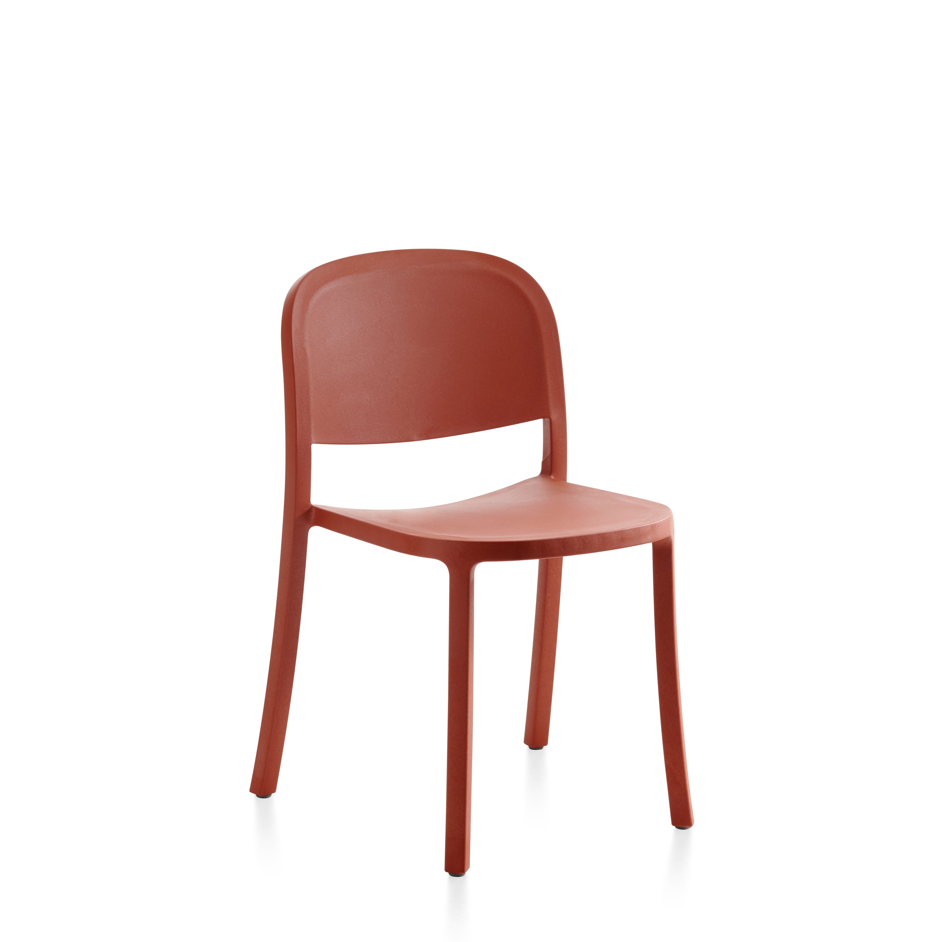 A recycled plastic Reclaimed Chair by Emeco, in orange.