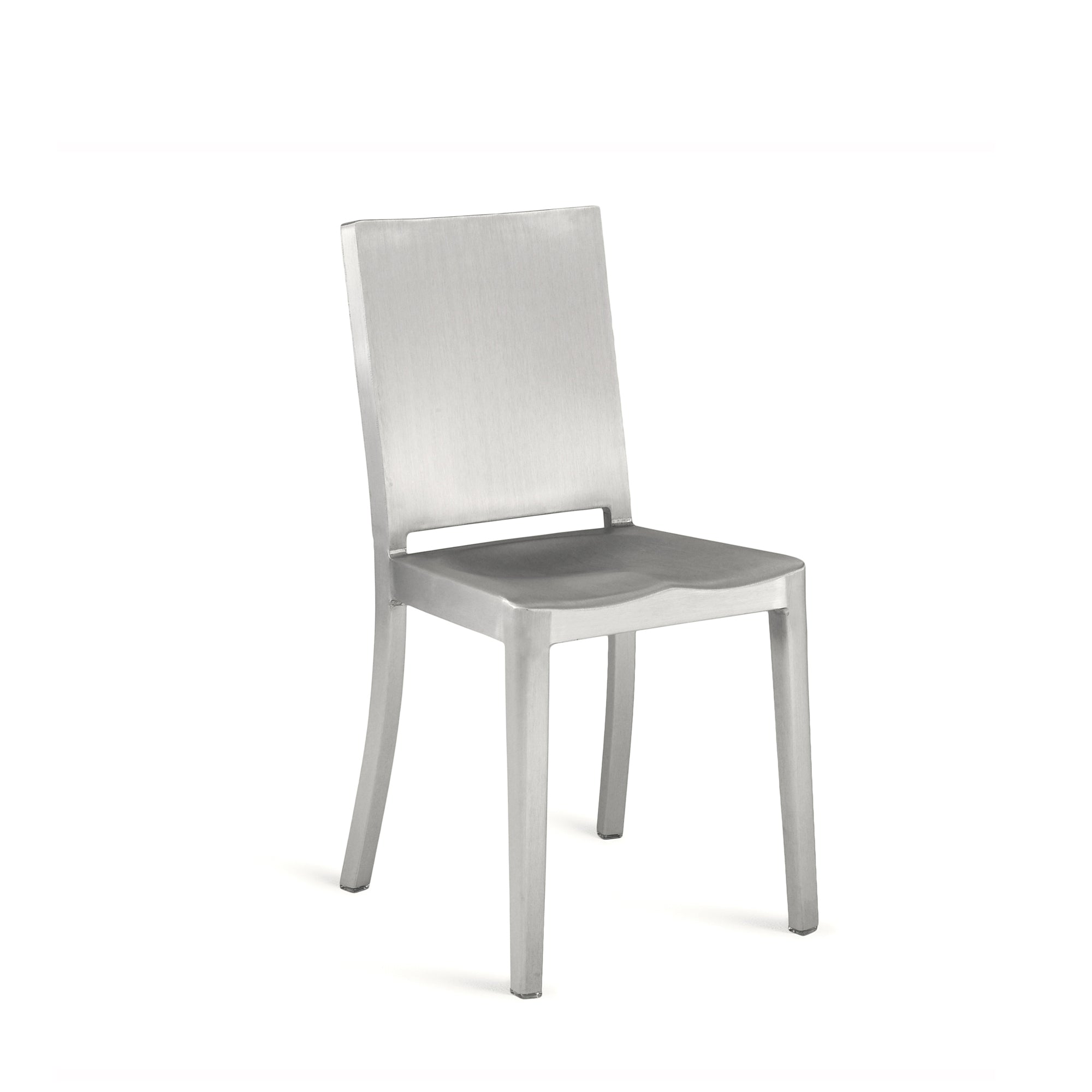 A recycled metal Hudson Chair by Emeco, in a brushed finish.
