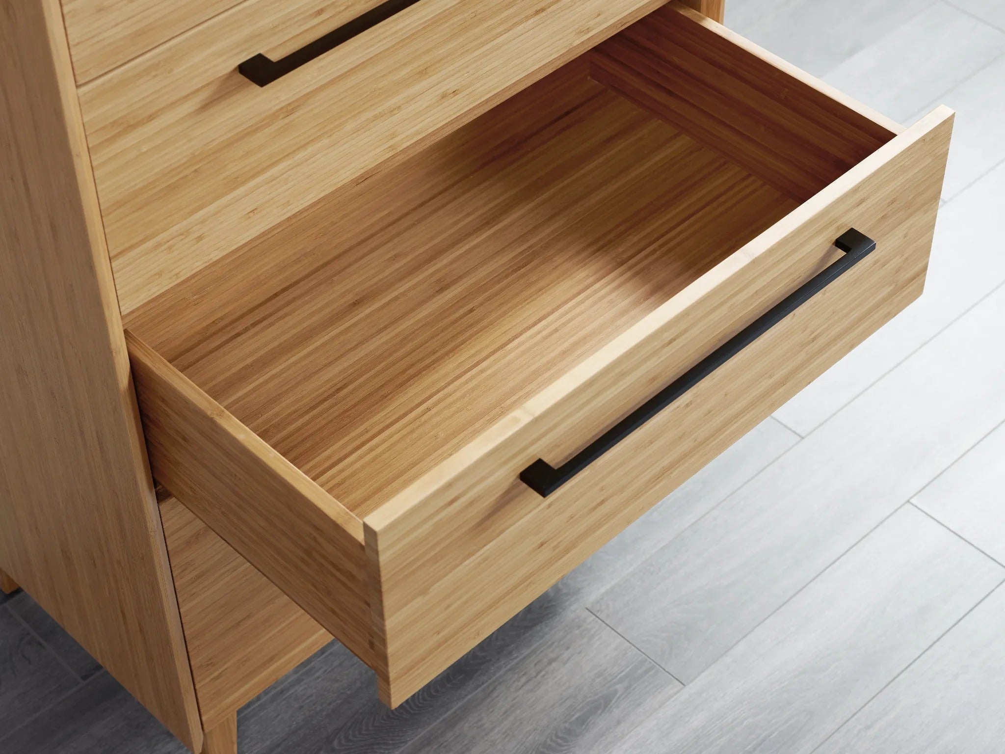 The drawer of the renewable Sienna Bamboo High Dresser, by Greenington.