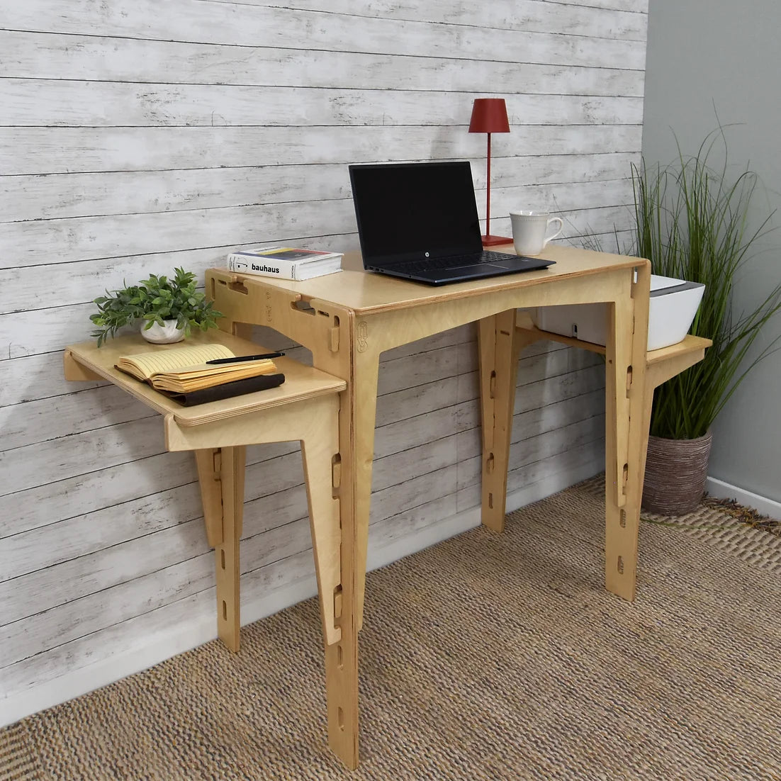 A sustainable MOD5 Adjustable Modular Desk with Two Shelves by FiVO, made of FSC-certified wood, with the two shelves adjusted.