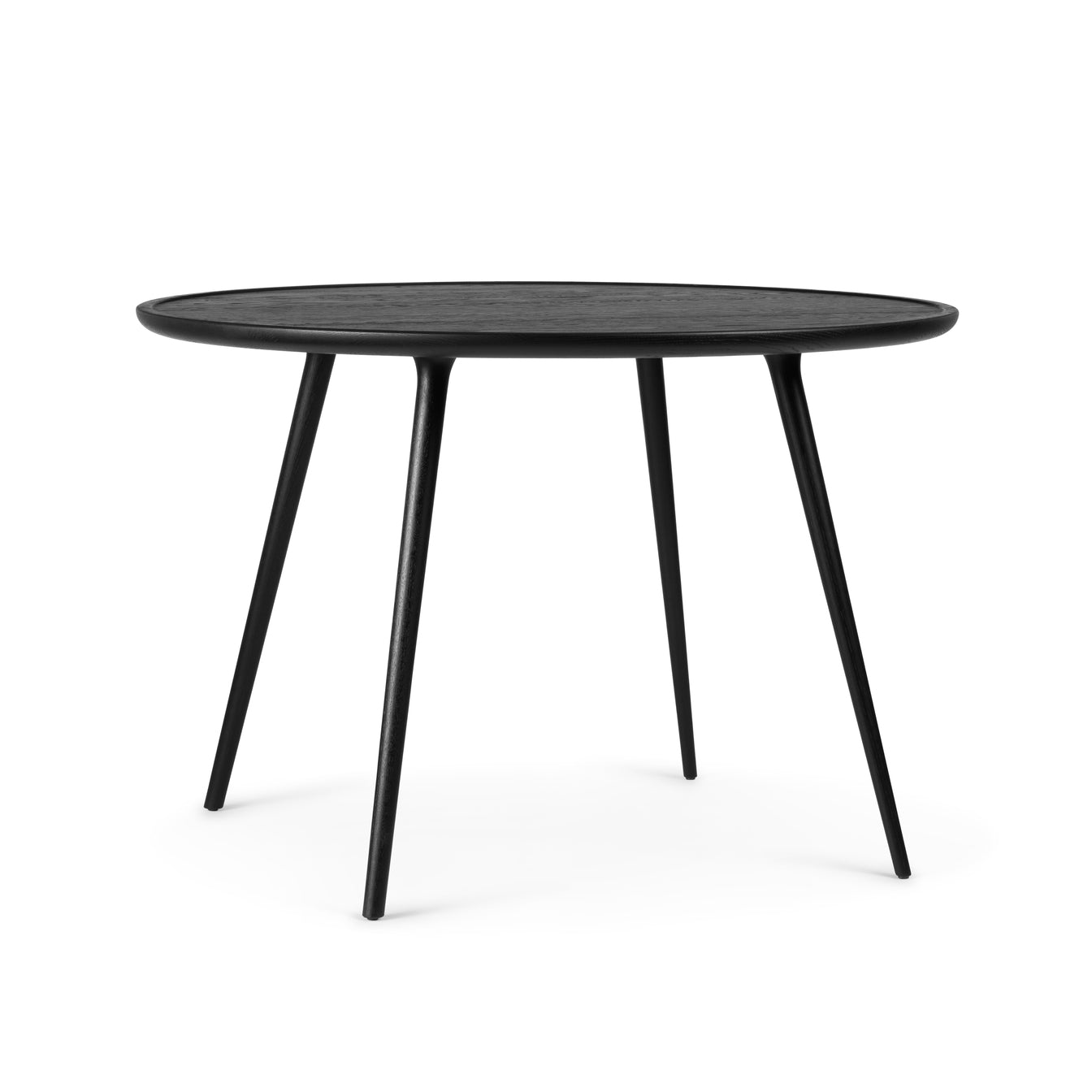 A sustainable black Accent dining table made of FSC-certified wood, by Mater.
