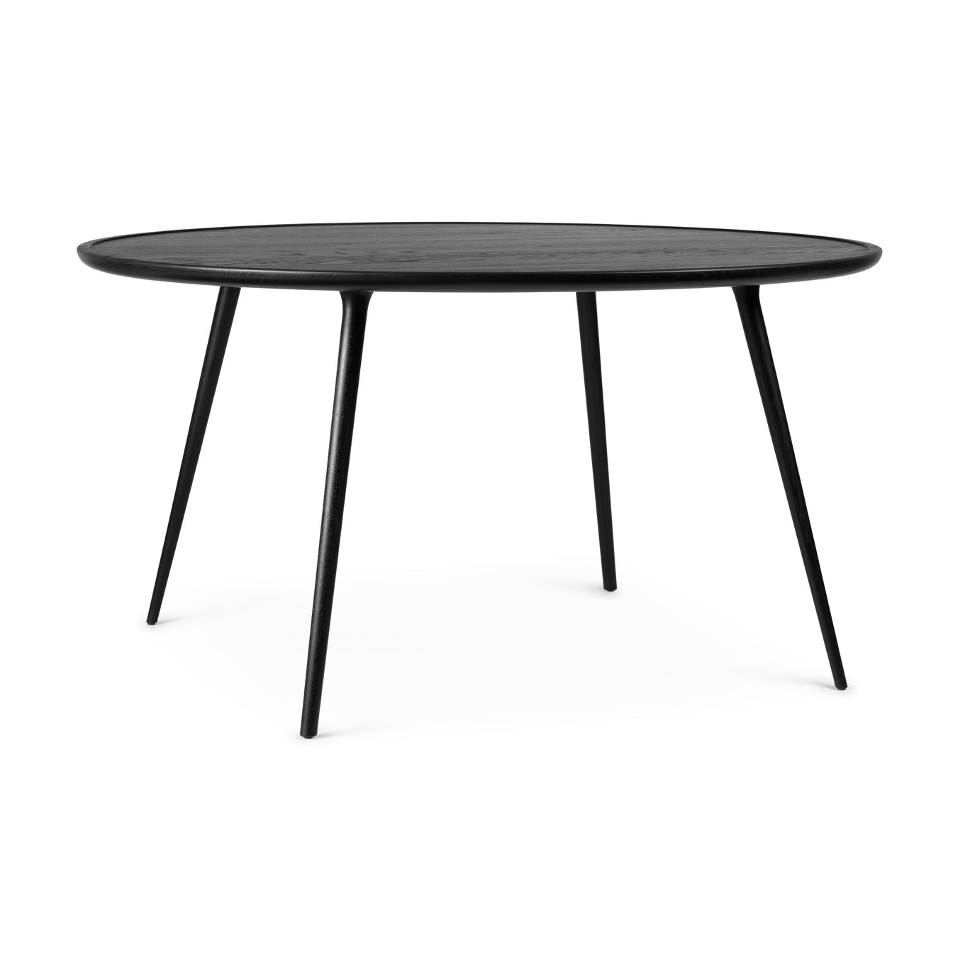 A sustainable black Accent dining table made of FSC-certified wood by Mater, in a large size.