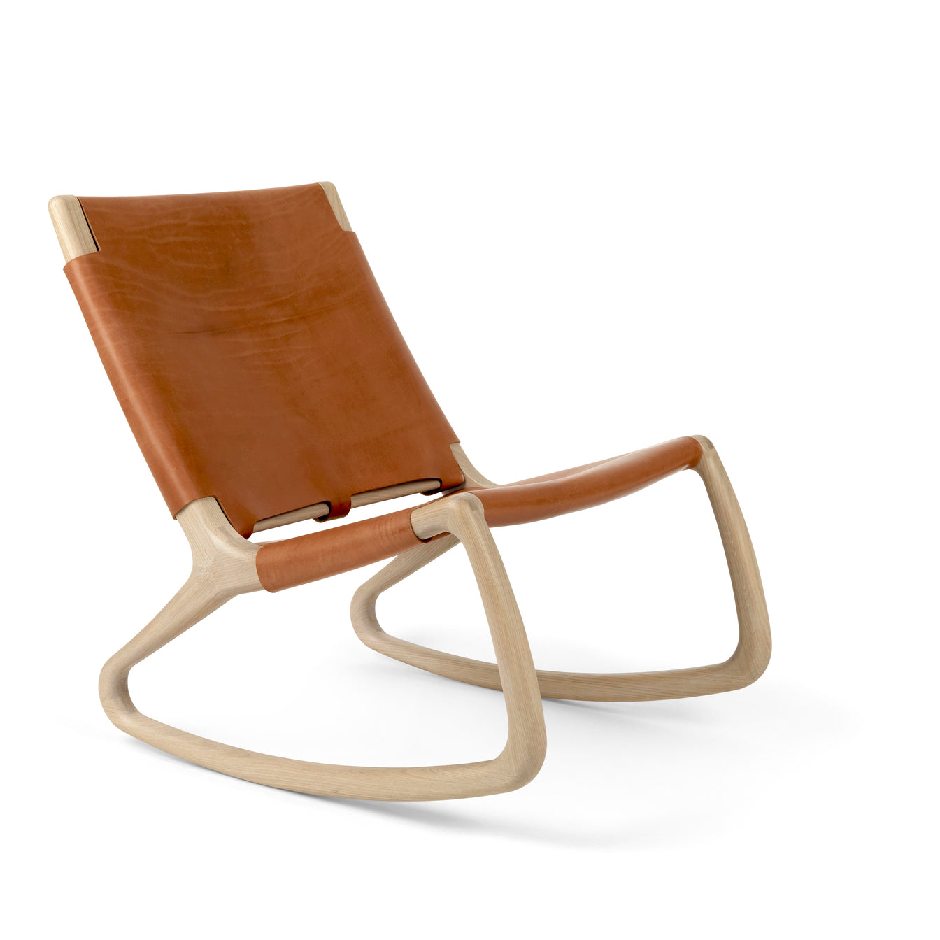 A tan leather Modern Rocker Chair made with FSC-certified wood, by Mater.