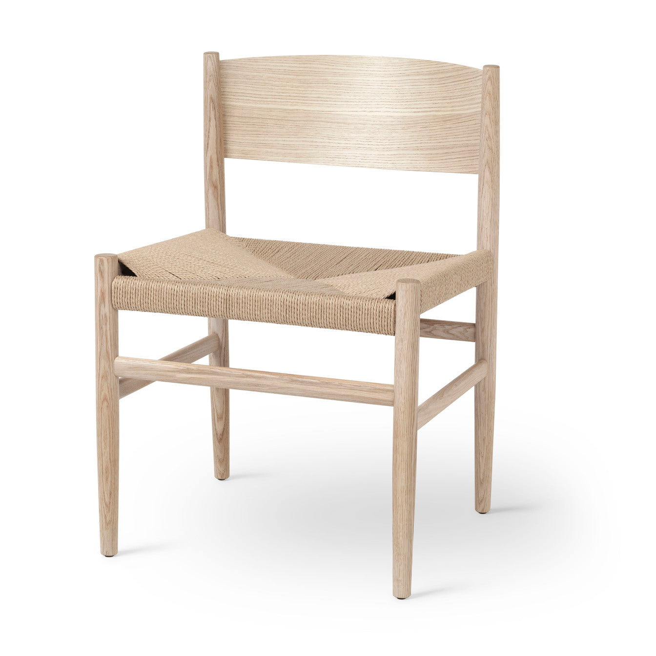 A white oak Nestor chair made of FSC-certified wood, by Mater.