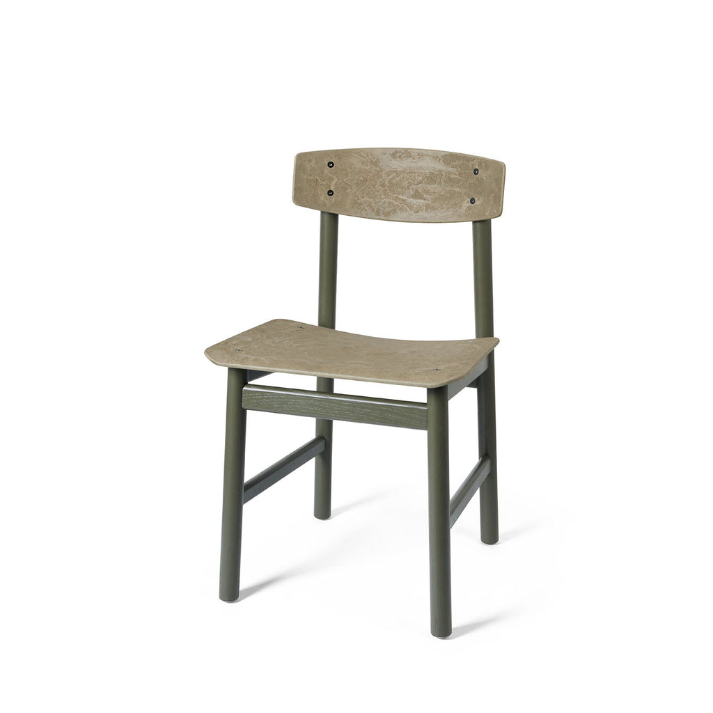 A green Conscious chair made with recycled material, by Mater, front view.