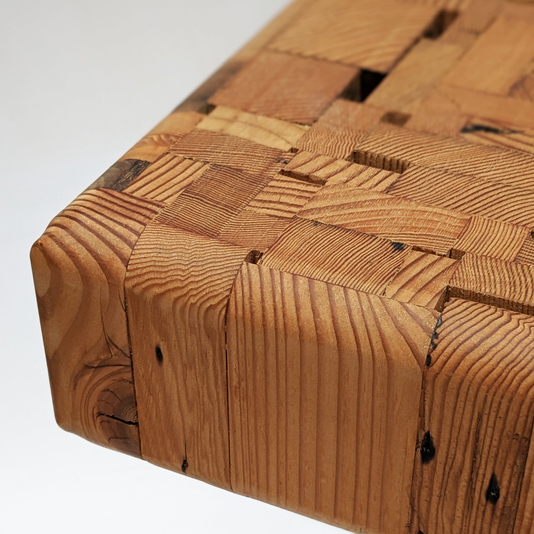 A close-up detail view of the handcrafted Assemblage Table by Formr.