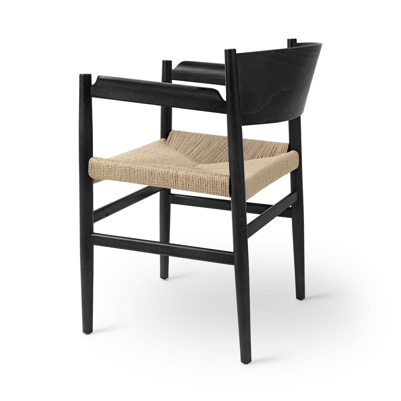 The Nestor eco-friendly dining chair with armrests. Made of FSC-certified wood by Mater, in black beech finish, back view.