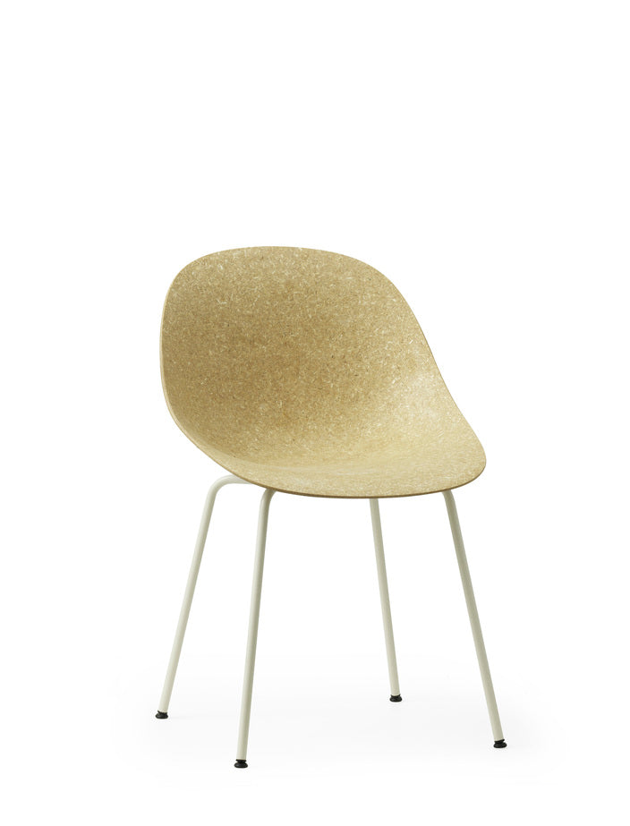 A eco-friendly chair made with hemp plants by Normann Copenhagen, with white-coated legs.