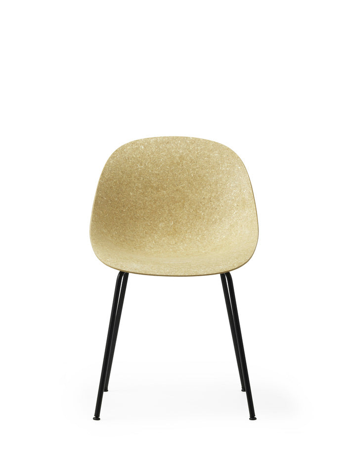 A renewable Mat Chair made with hemp plants by Normann Copenhagen, with black-coated legs, front view.