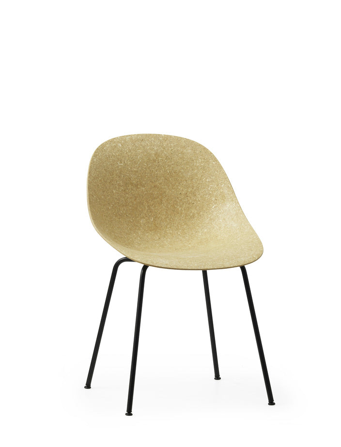 A renewable Mat Chair made with hemp plants by Normann Copenhagen, with black-coated legs.