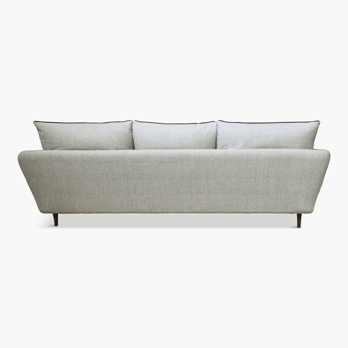A sustainable Casquet Classic Sofa, made of FSC-certified wood by Biosofa, in light grey, back view.