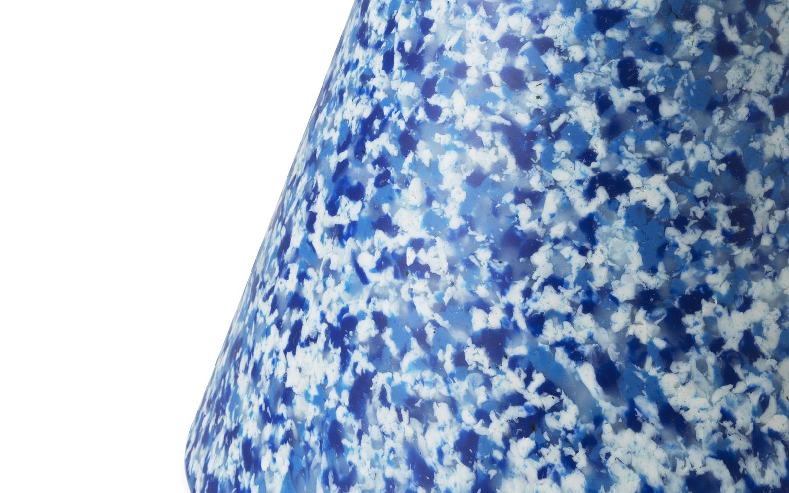 A Bit Stool Cone in Blue, made of recycled material by Normann Copenhagen, detailed view.