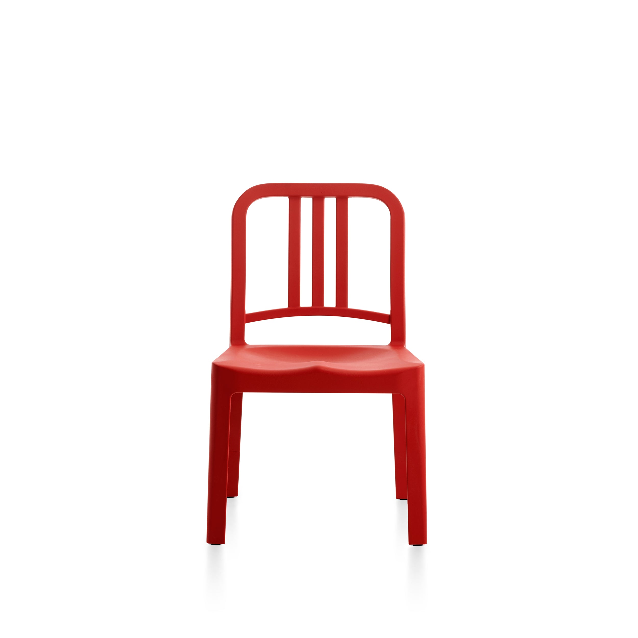 A recycled bottle mini 111 Navy Chair by Emeco, in red.