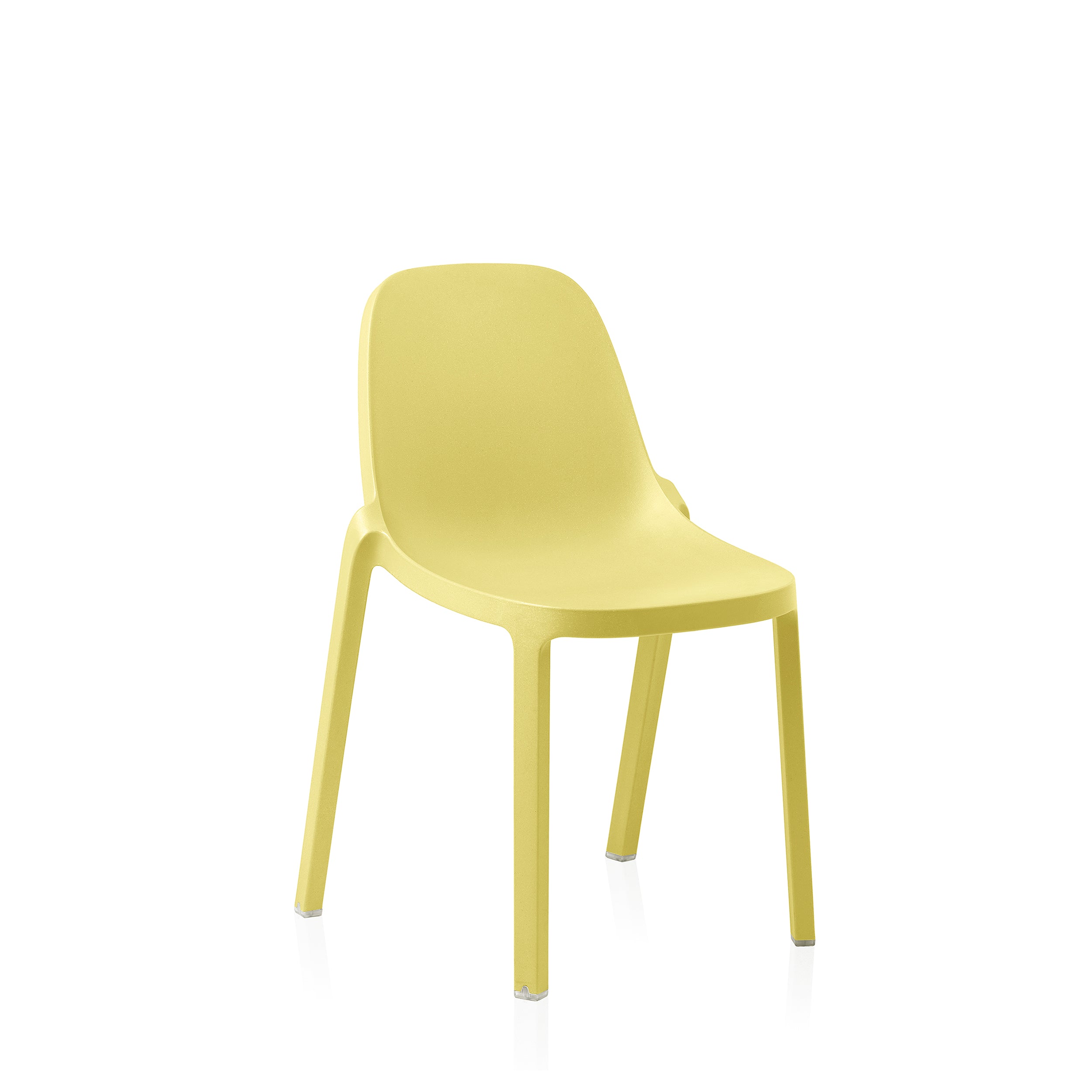 A recycled plastic Broom Chair by Emeco, in yellow.