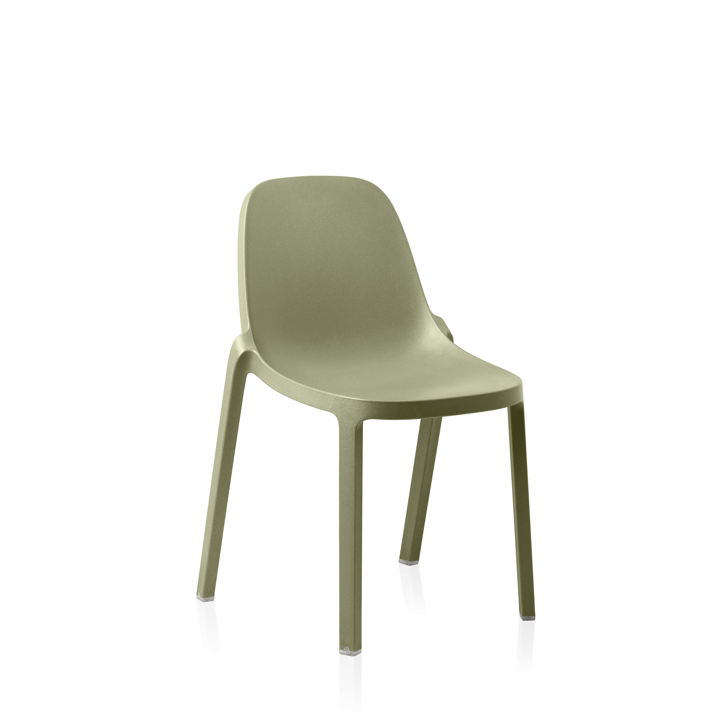 A recycled plastic Broom Chair by Emeco, in sage green.