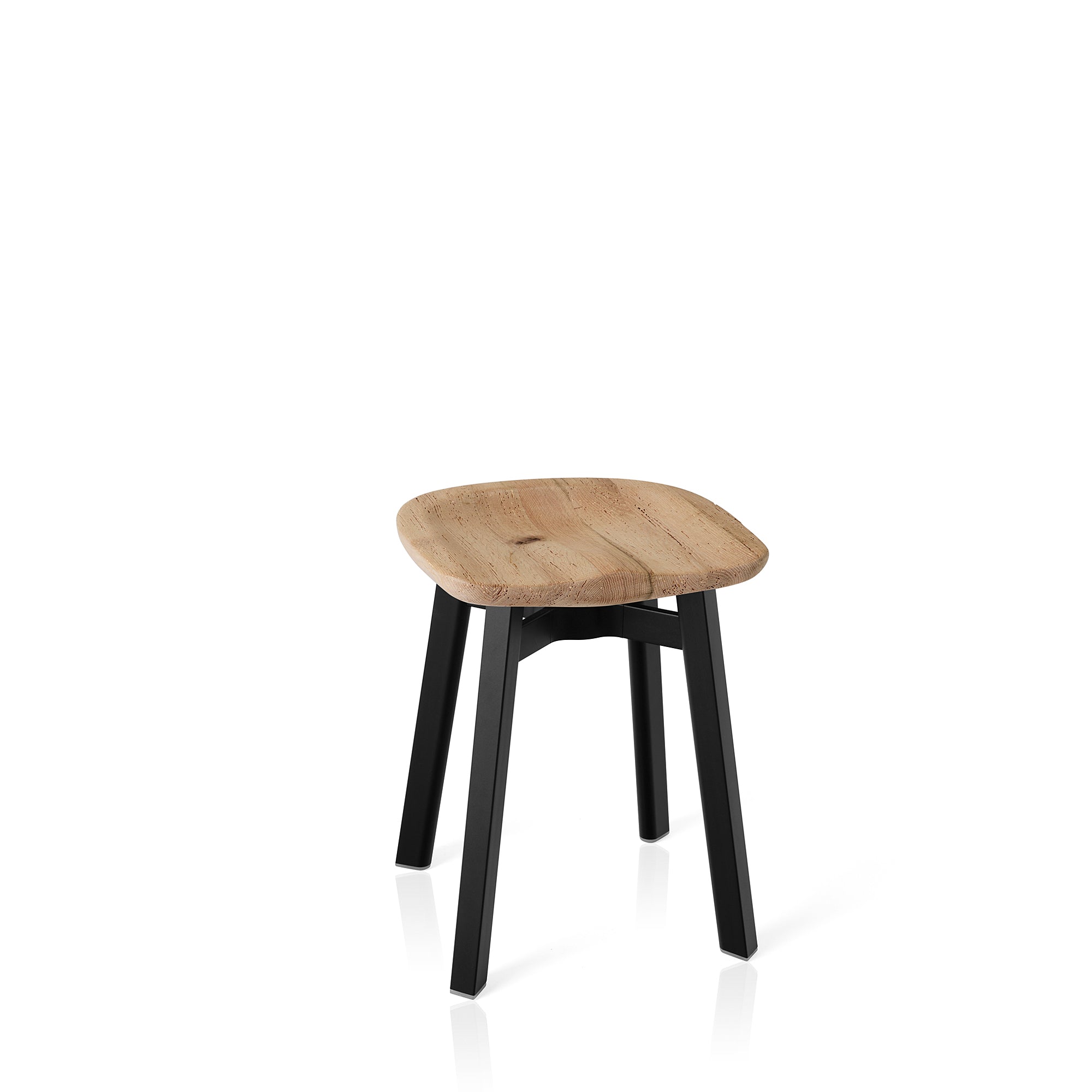 A reclaimed oak Su Stool by Emeco.