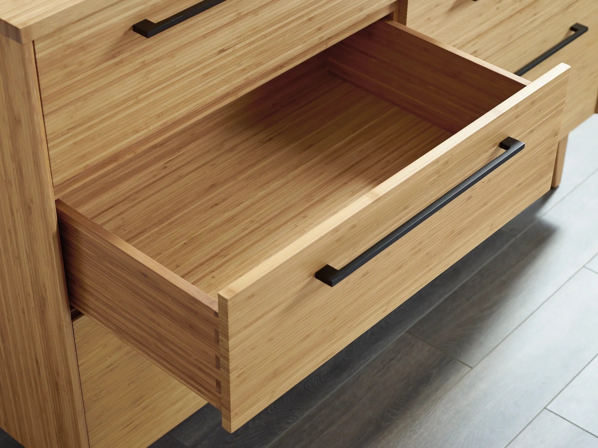 The detail of the inside drawer of the sustainable Sienna Bamboo Low Dresser, by Greenington.