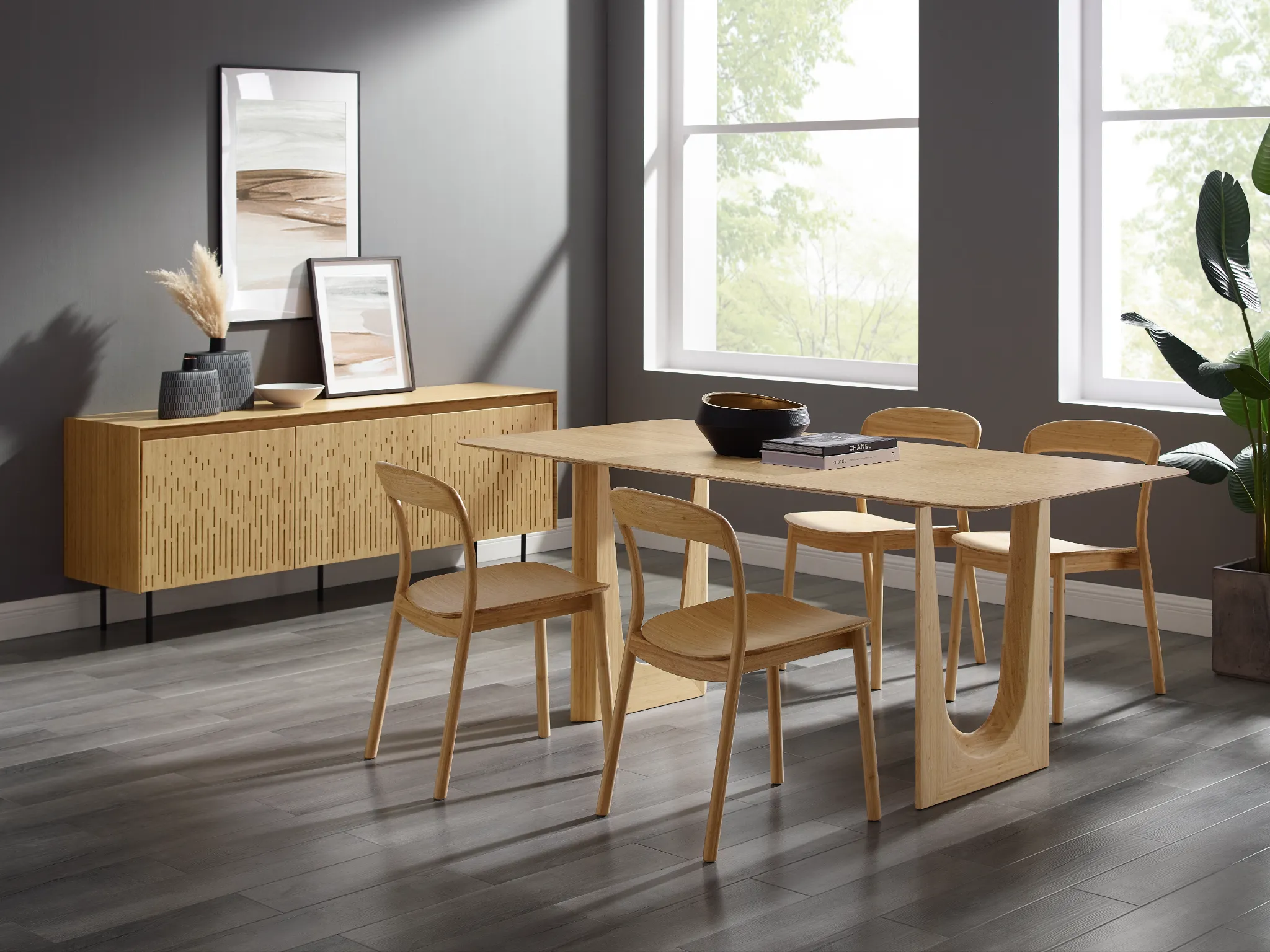 A Hanna Bamboo Console Sideboard by Greenington, shown with a light colored bamboo dining table set.