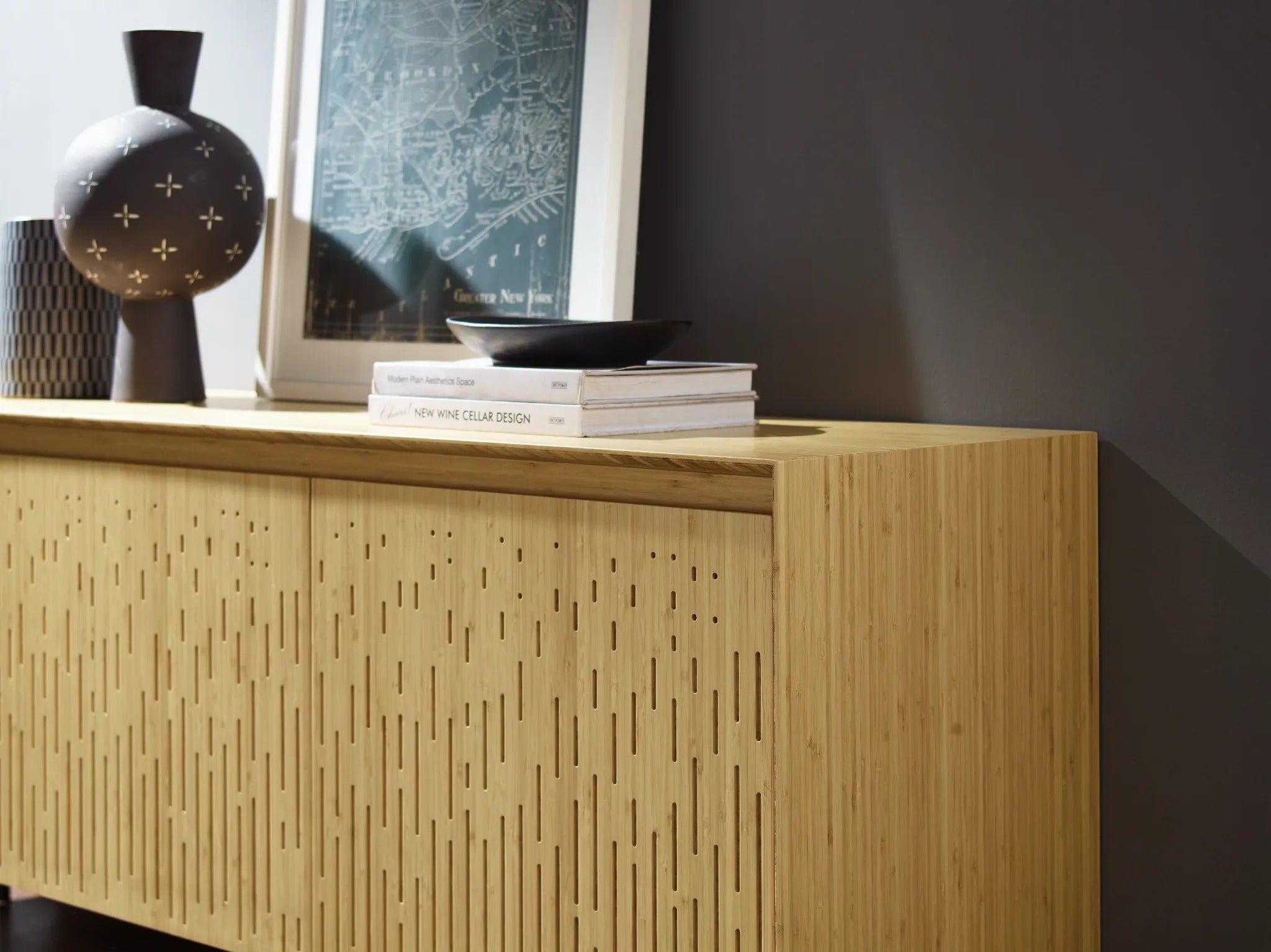 A sustainable Hanna Bamboo Console Sideboard by Greenington, placed in a living room.