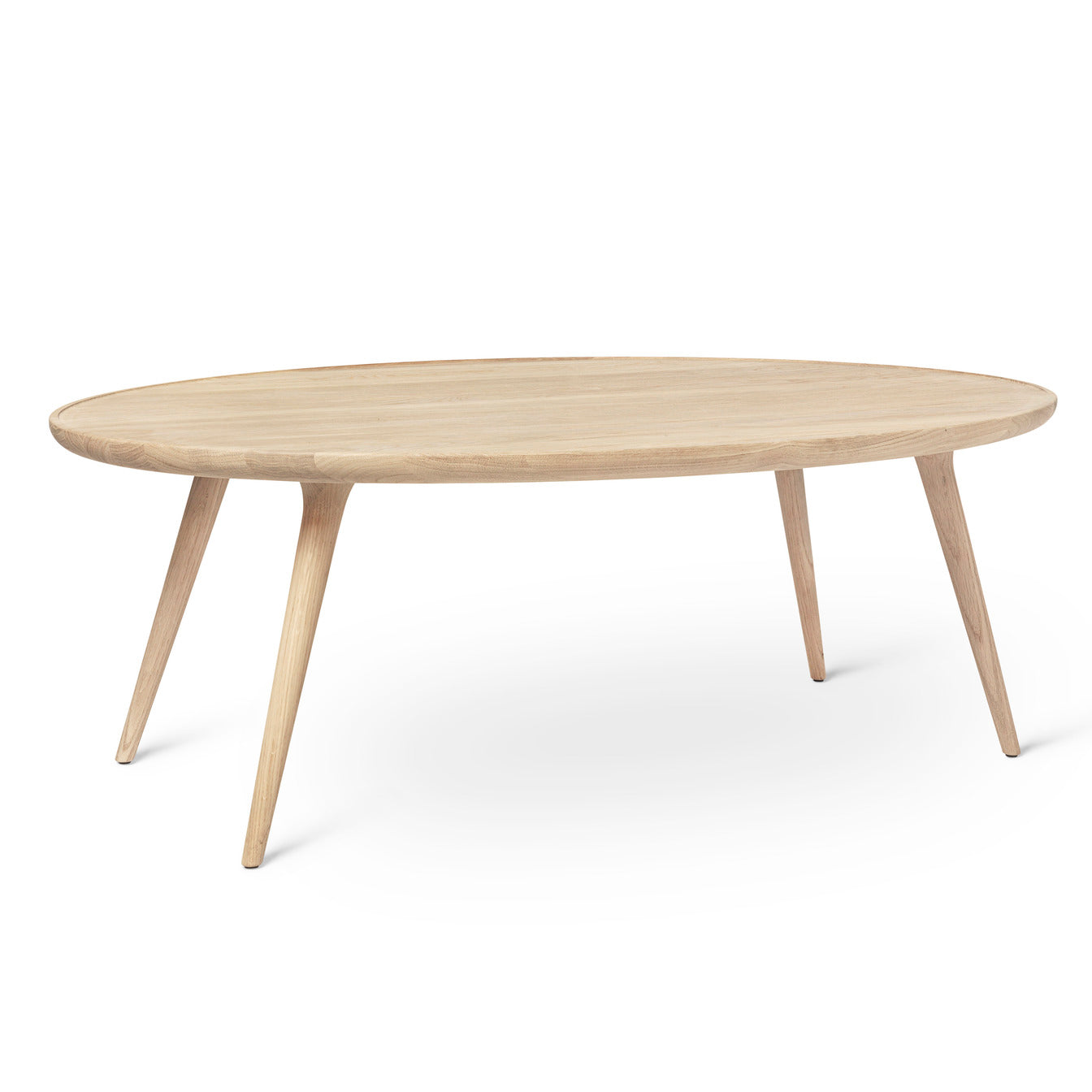 An Accent Oval Lounge Table, Sustainable Oak, made of FSC-certified wood by Mater, in matte white lacquer.