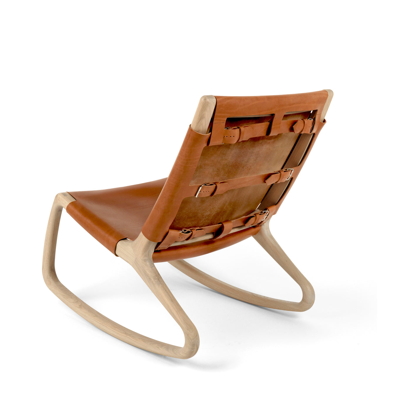 A tan leather Modern Rocker Chair made of FSC-certified wood by Mater, back view.