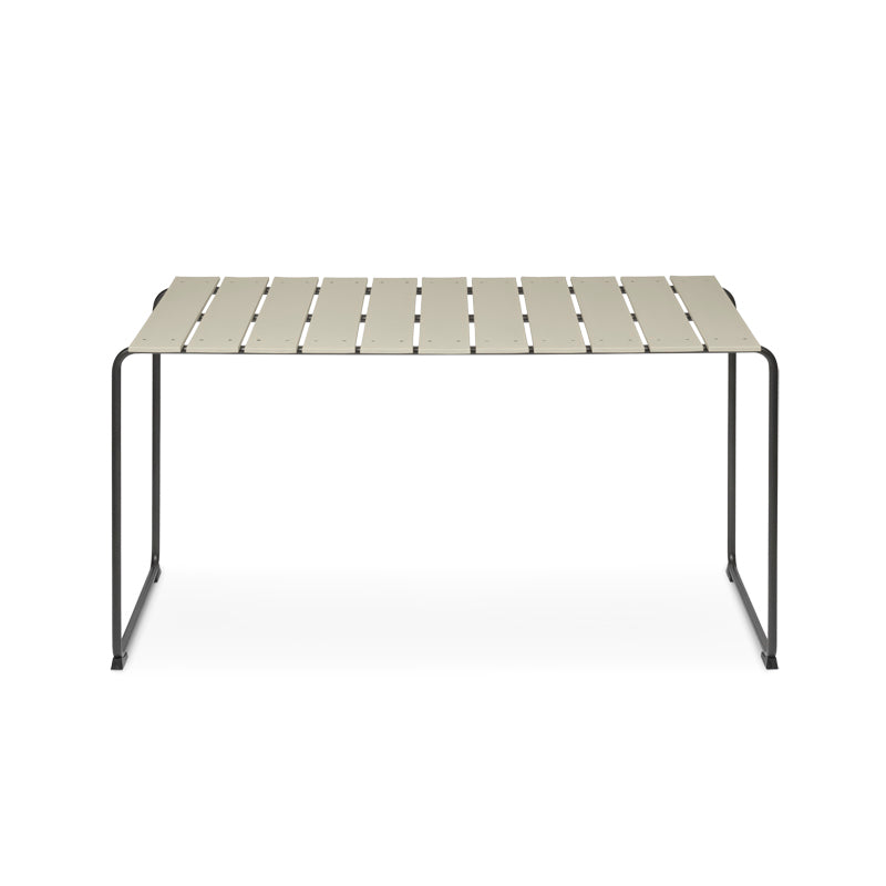A rectangular Ocean Table made with recycled materials by Mater, in sand color, front view.