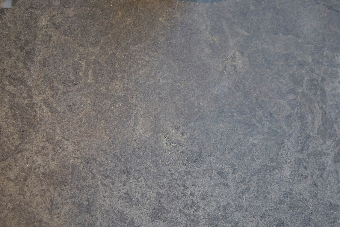 The texture of the black Conscious chair made with recycled material, by Mater.