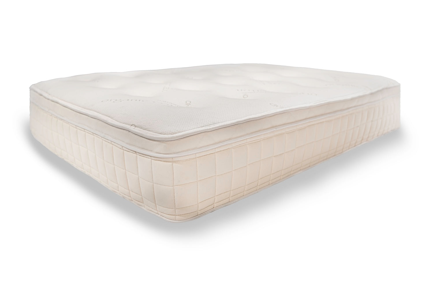 White pillow top mattress on a white background from side angle