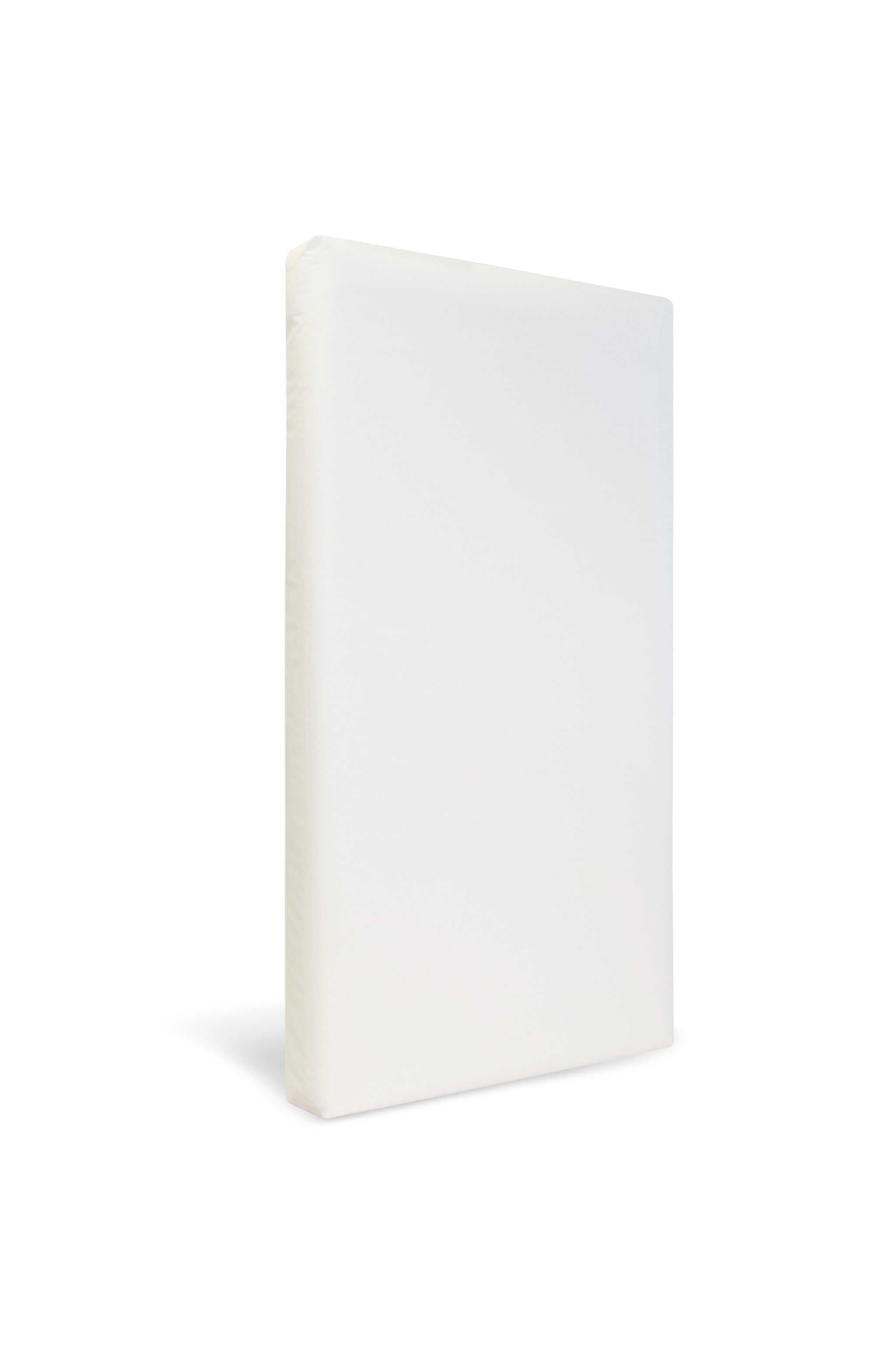 White baby crib mattress made of organic cotton on a white background