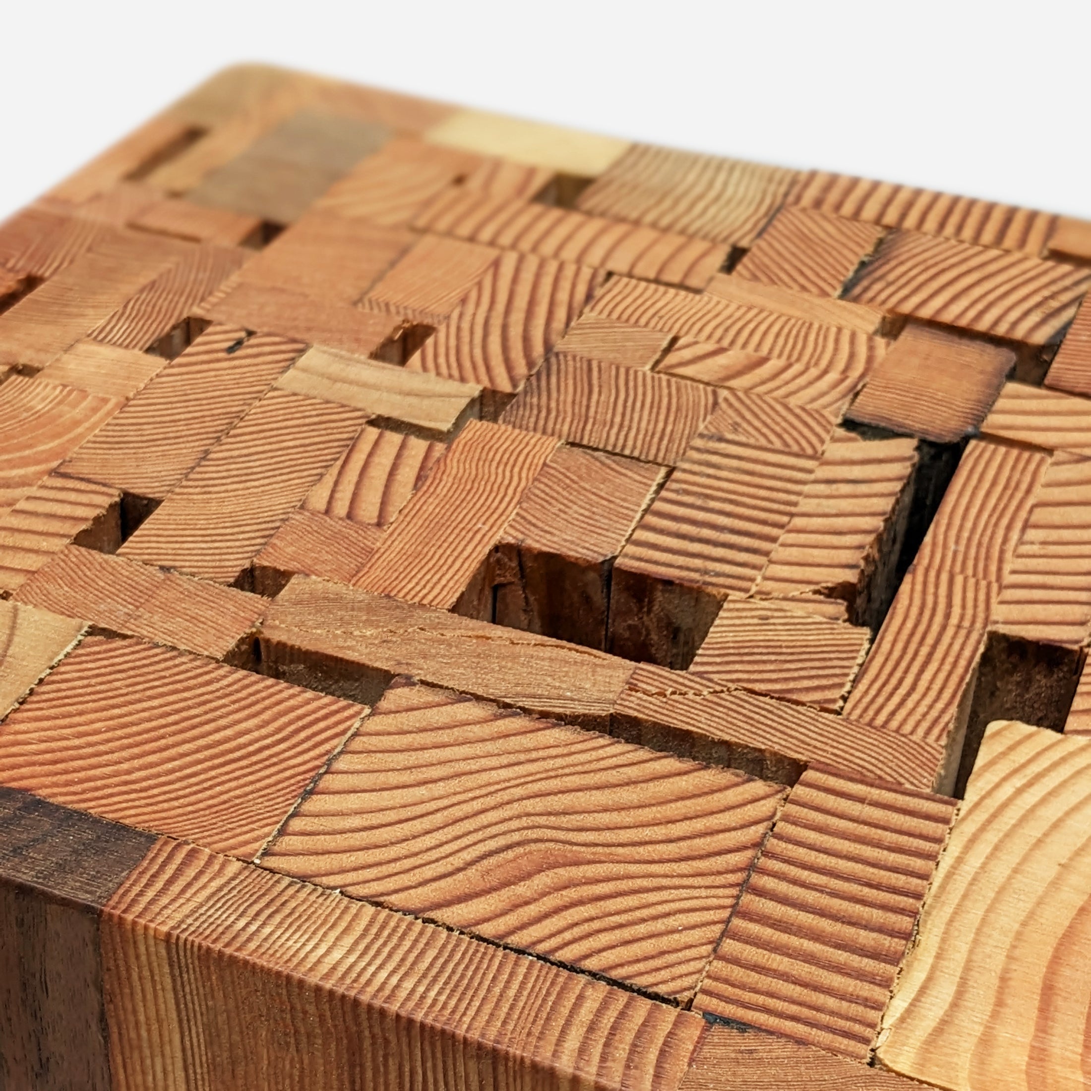 A handcrafted recycled wood Assemblage Side Table by Formr, close-up look.