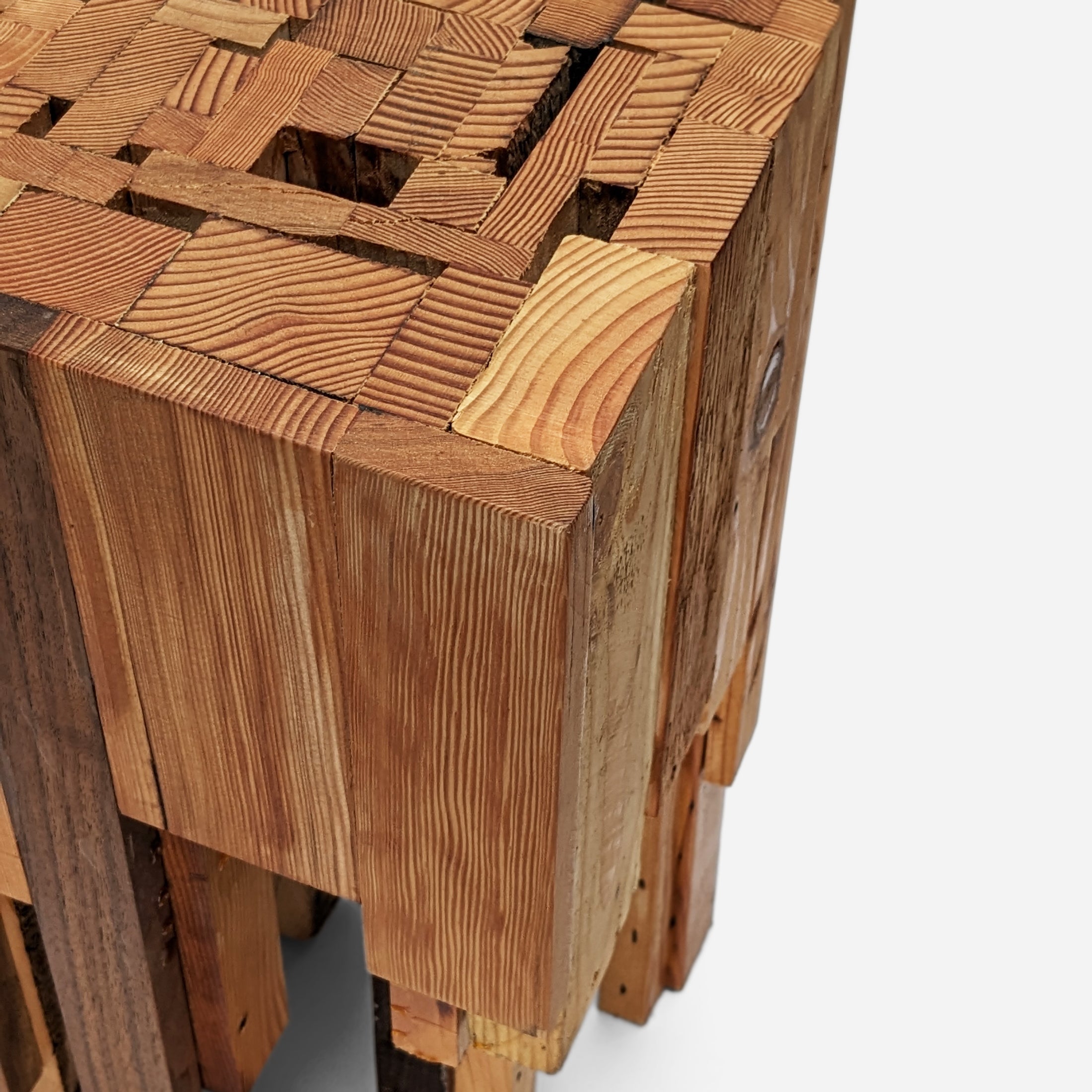 A handcrafted recycled wood Assemblage Side Table by Formr, close-up detailed look.